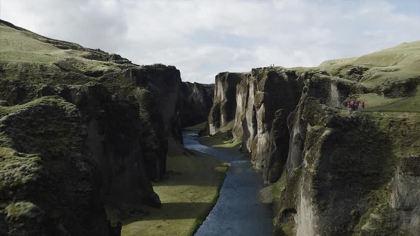 River winding through a grassy canyon area
