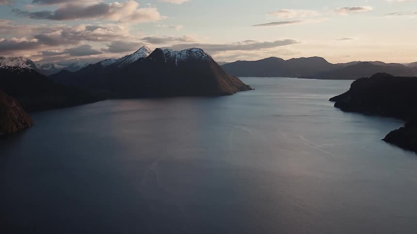 Mountains surround a large lake