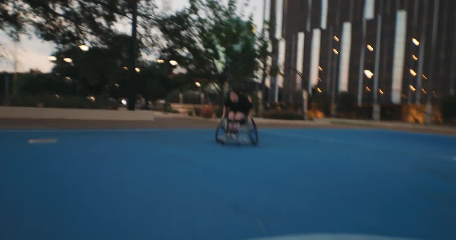 A girl dribbles the ball on the basketball court