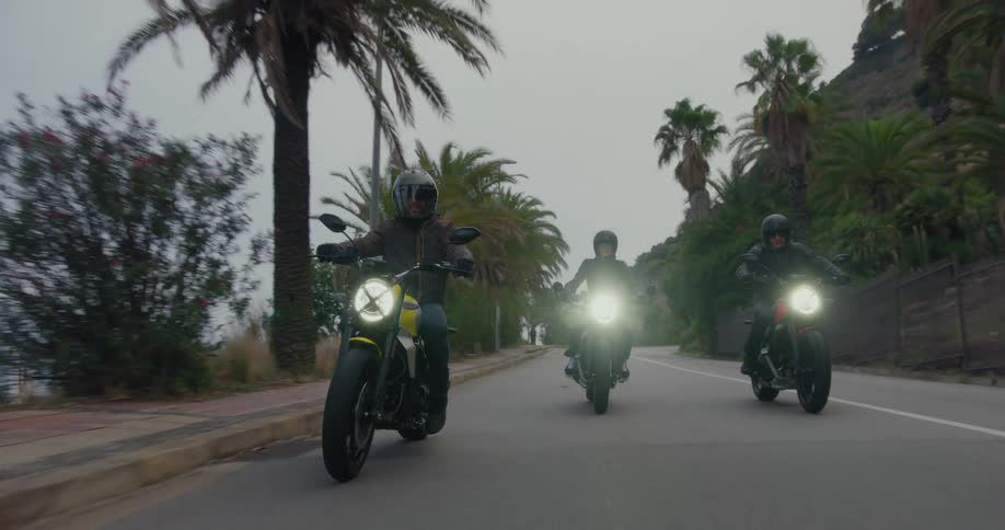 Three bikers riding their motorcycles