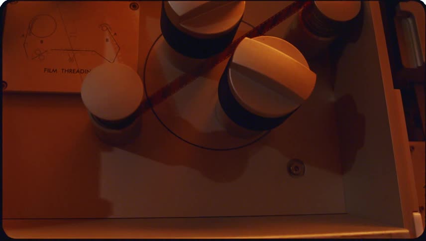 Film sliding through rotating parts on a large machine