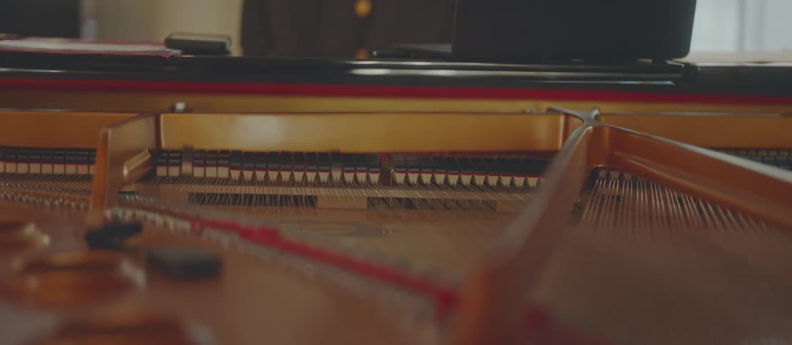 Man sitting playing piano