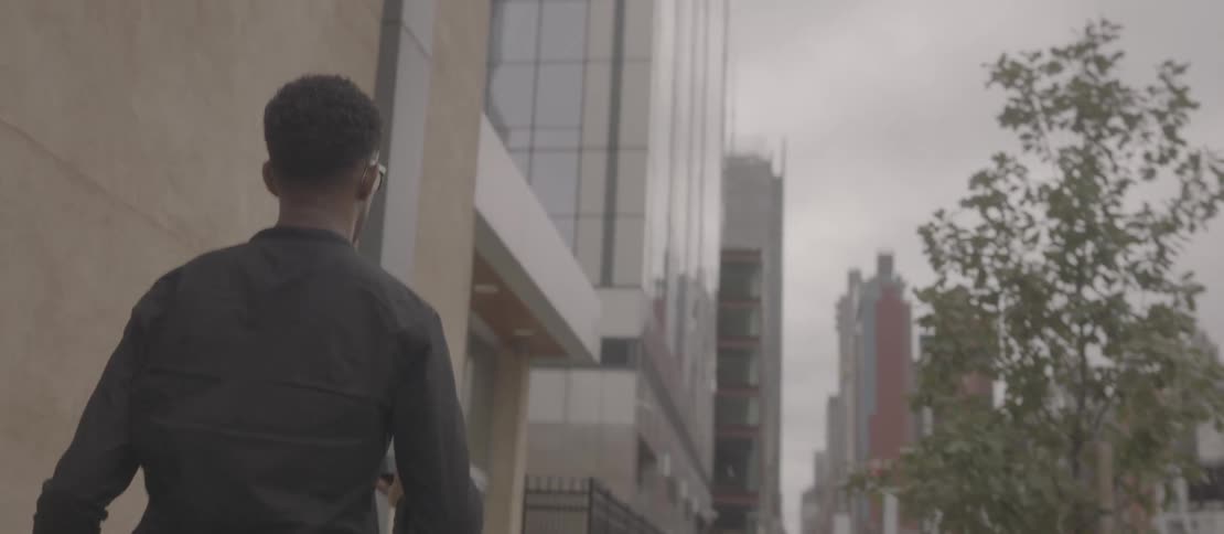 Man walking through the streets of a metropolis