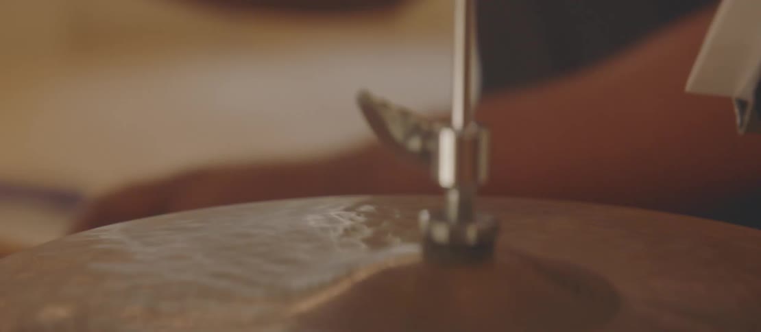 A man is playing the drums