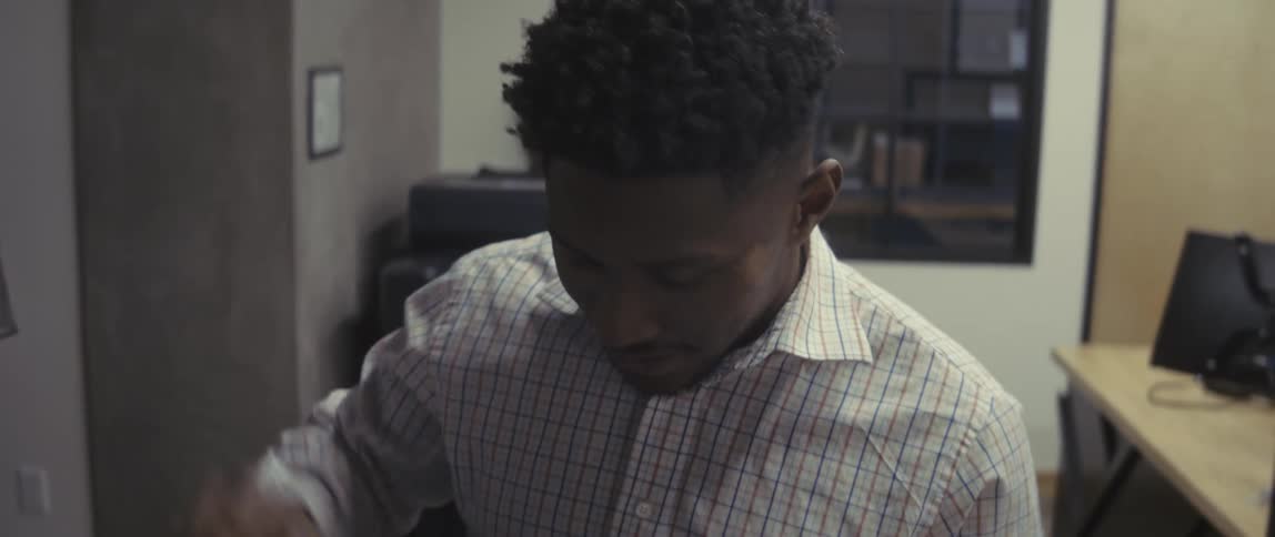 Two men saying goodbye in an office setting