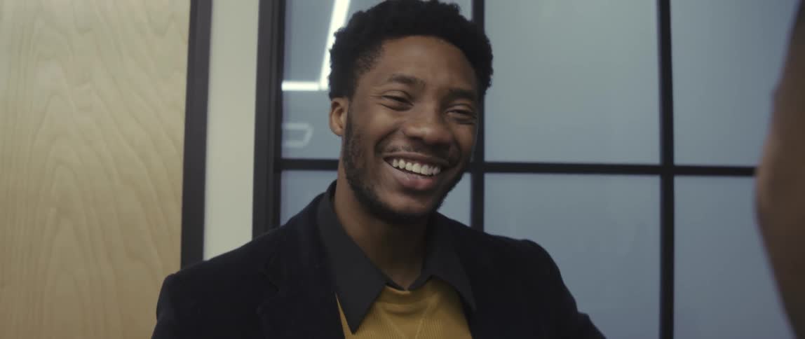 Two men talking happily