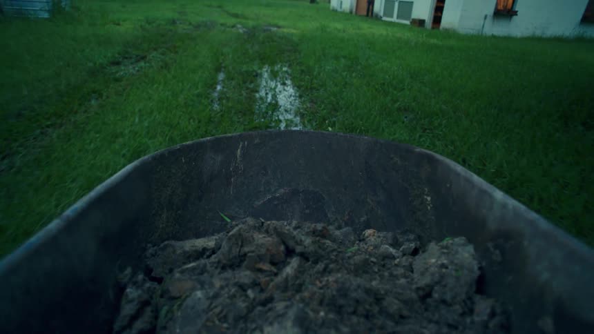 Point of view of land being thrown into a grass with water