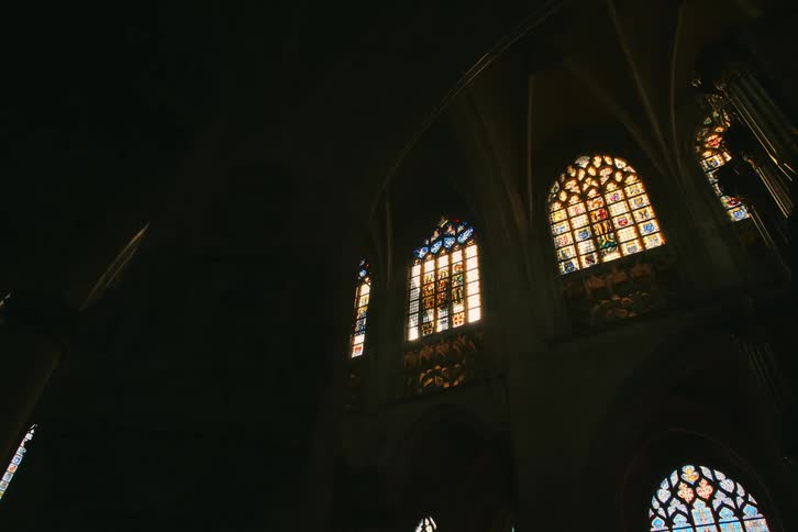 Interior of a cathedral with windows reflecting sunlight