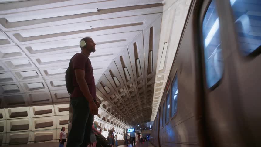 People are waiting for the train in the subway
