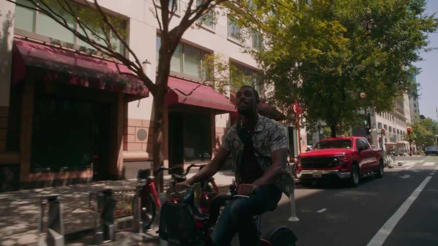 A clip of a person riding a bicycle on the street
