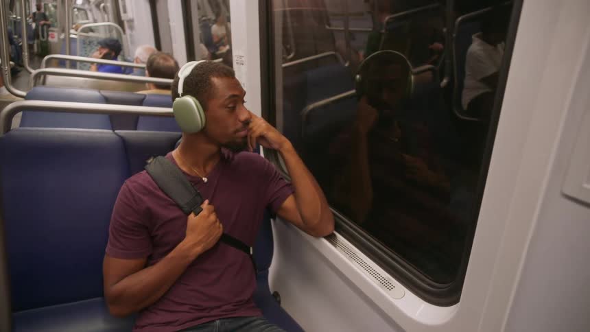 People are riding in the subway train
