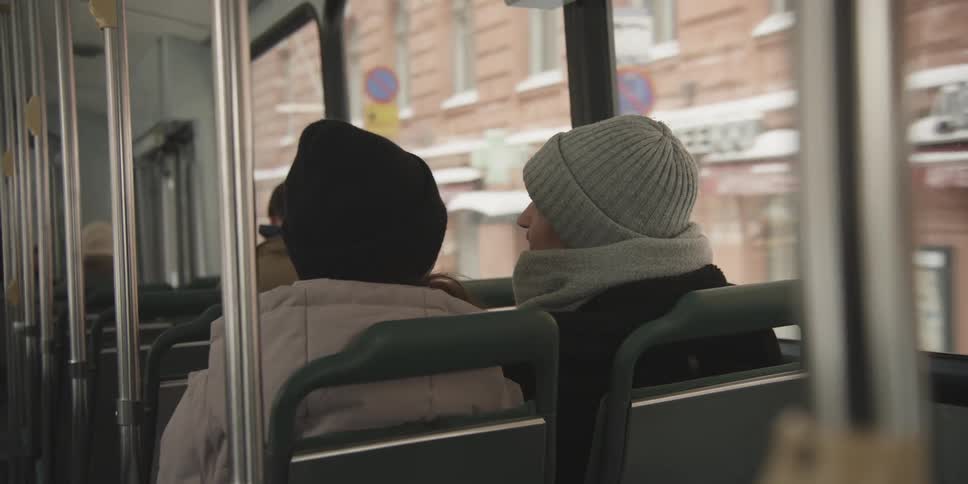 Passengers inside a moving bus