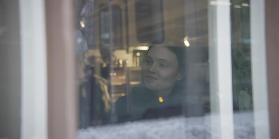 A couple drinking hot beverages on a restaurant