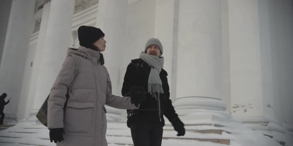 A couple are touring an old building