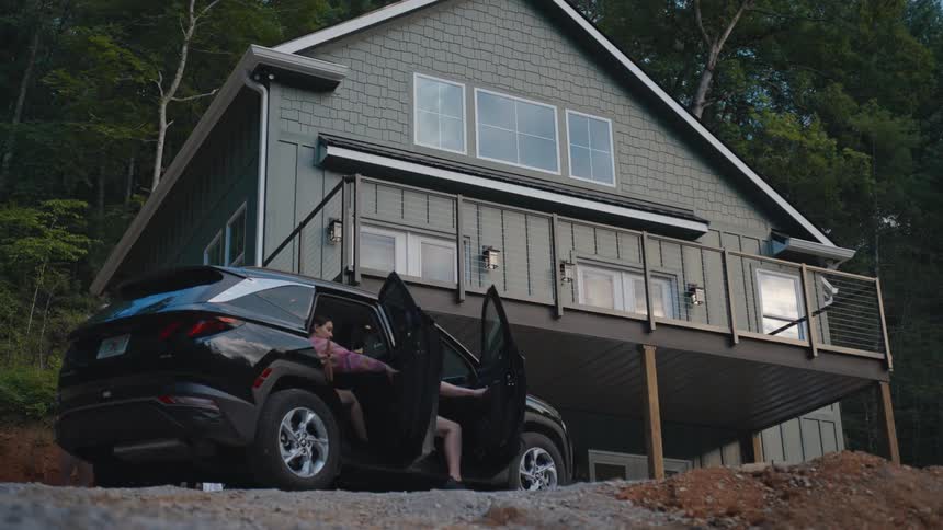 People getting into a car