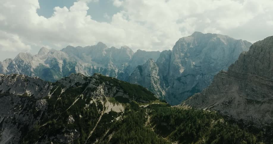 Aerial panorama of a mountainous landscape with cliffs on a cloudy day