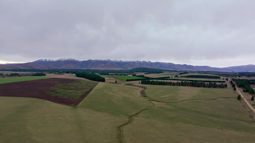 Aerial of a remote grassland on a cloudy day