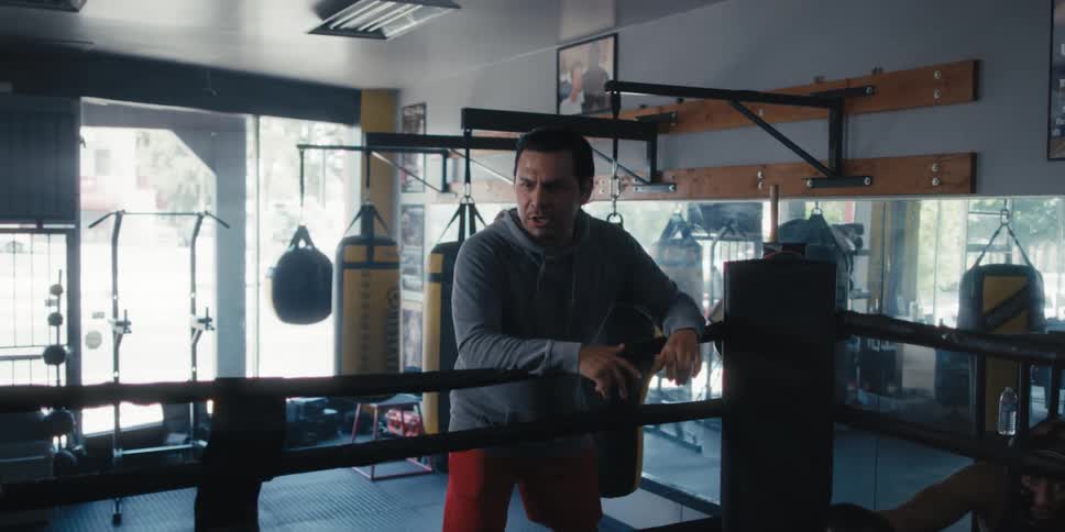 Men invading a boxing ring