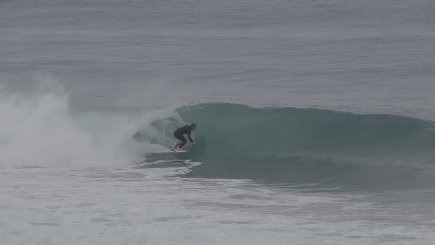 Surfer riding a wave