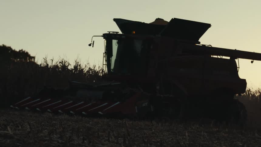 Agricultural machine harvesting a field