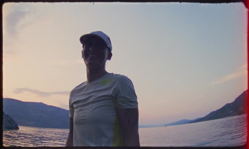 Smiling elderly person at the seaside