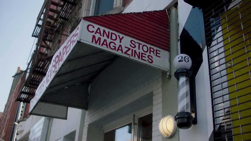 Exterior view of a candy and magazine selling house