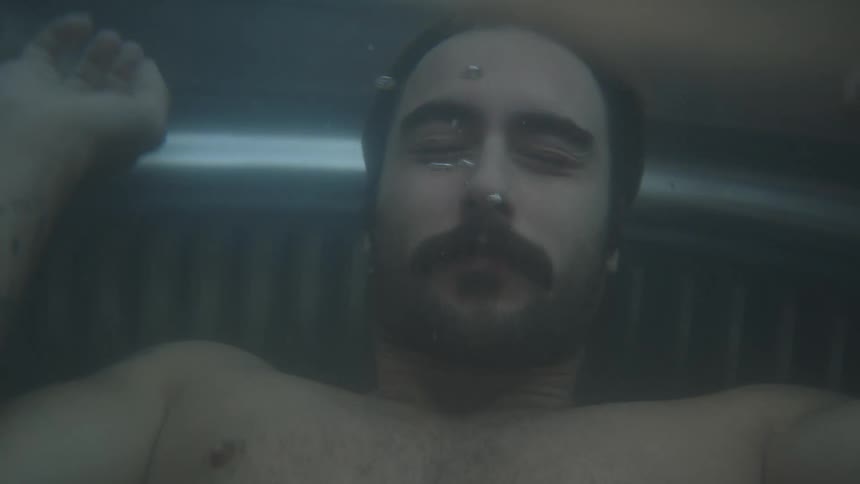 Man diving into a bathtub