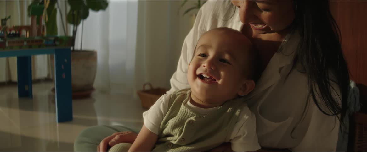 A clip of a mother and son sharing a happy moment