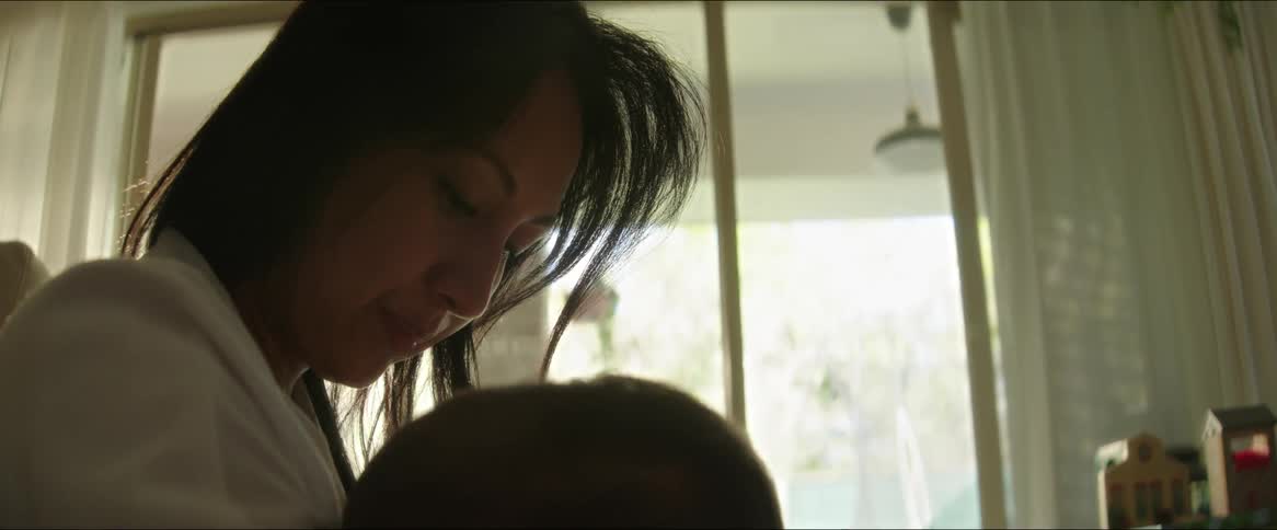 A clip of a mother feeding her baby