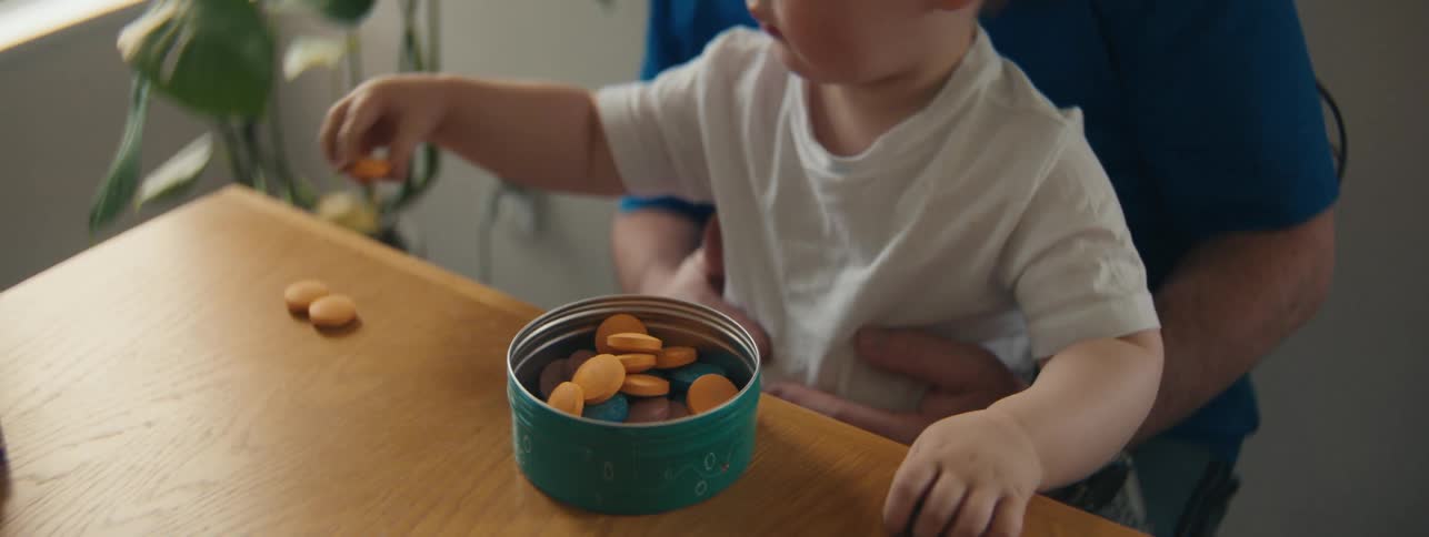 Little boy playing on the table