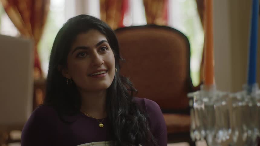A woman is looking and smiling