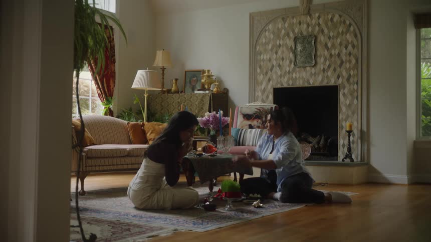 A clip of two friends arranging the table