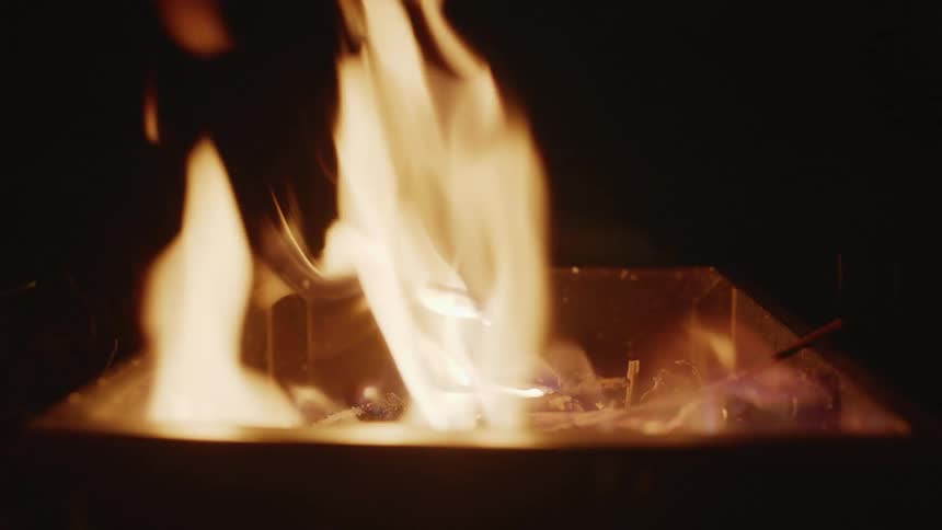 Flame of fire emerging from a box