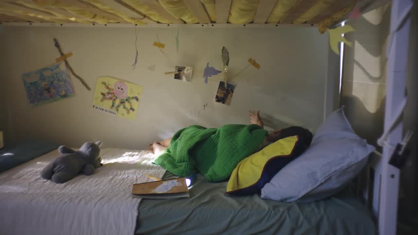 Child lying in bed