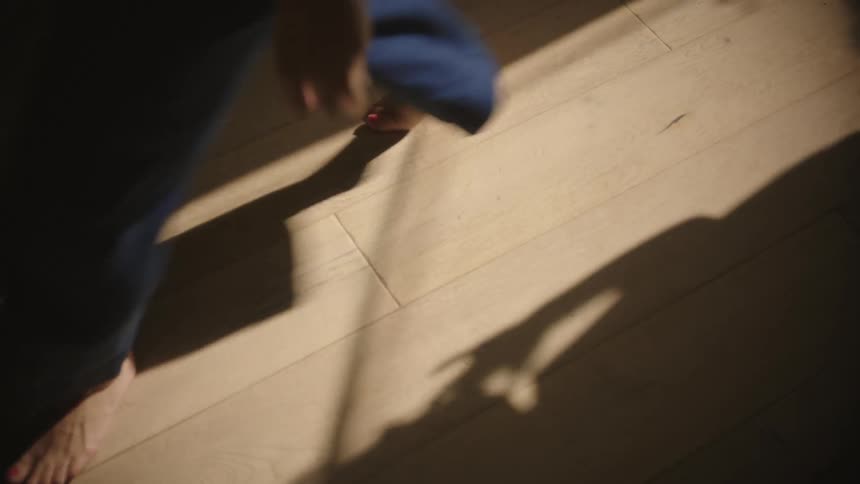 A clip of a person running into the house