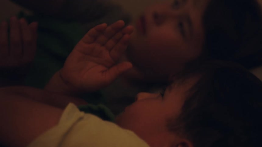 A clip of two kids playing with flash light