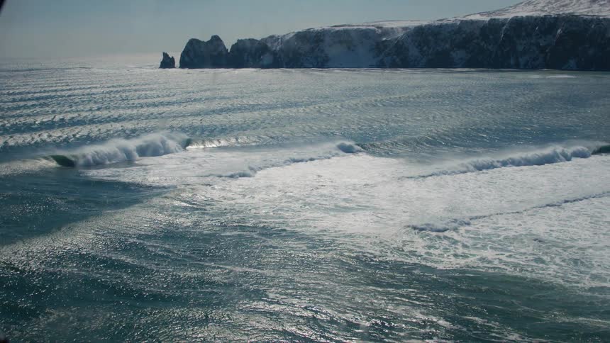 An aerial clip of the sea from a window