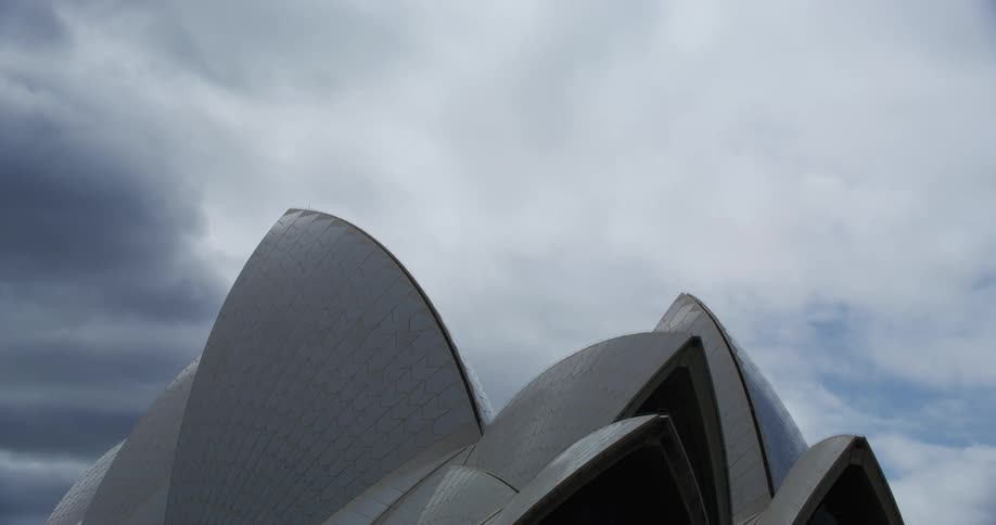 Sydney opera house peaks on cloudy day