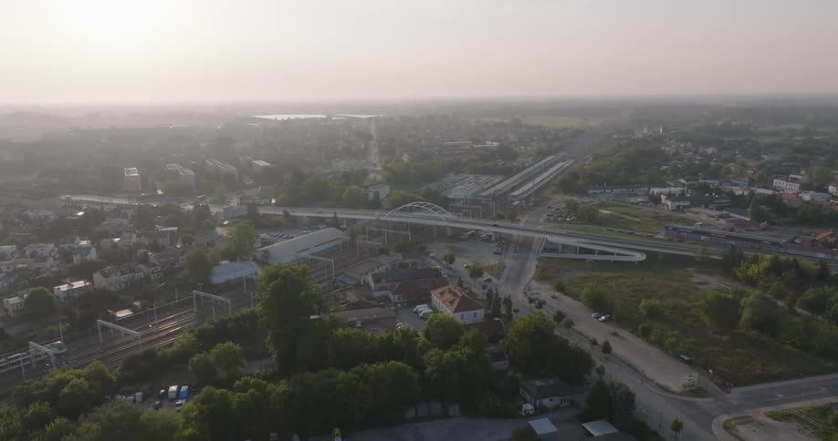 Aerial of apartment buildings and a bridge in a suburb