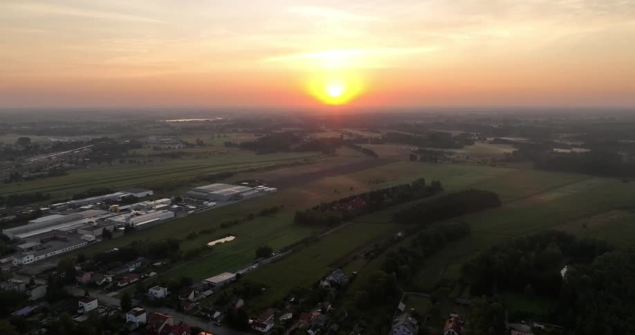 The sun is rising on the small town