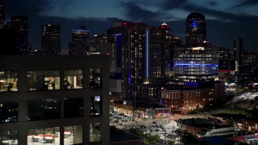 Night cityscape with illuminated buildings