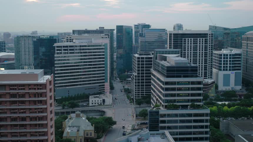Aerial and panoramic view of a metropolis with large urban and commercial buildings