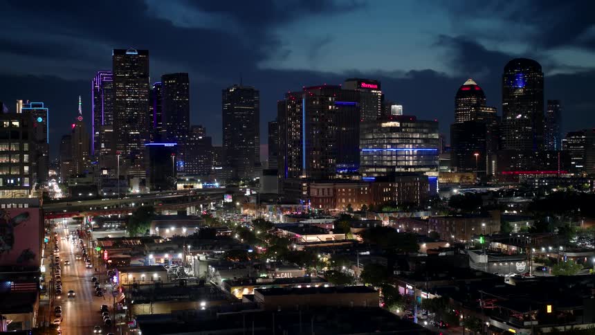 Aerial view of a citys downtown area at night