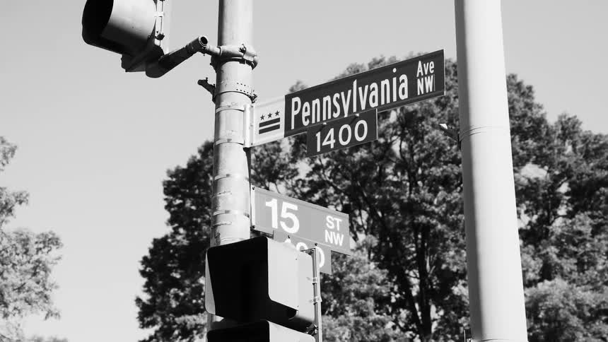 Traffic lights and street signs on a city intersection