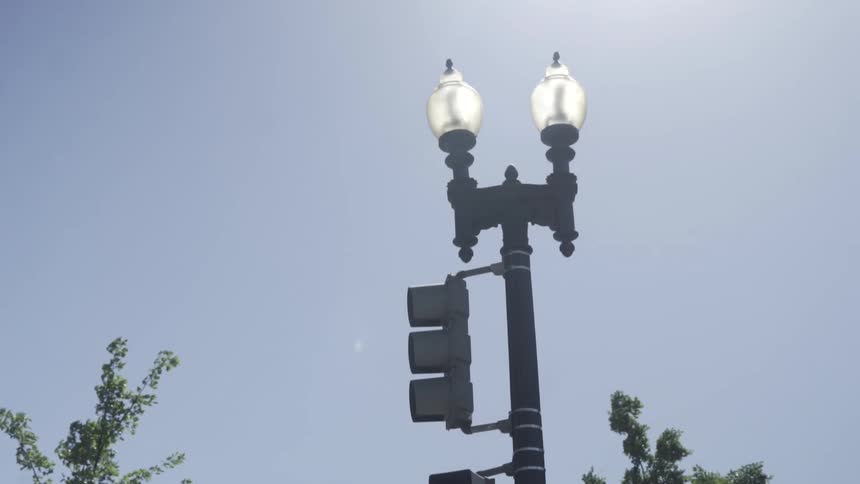 Streetlight lit up in the city