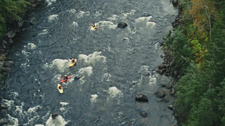 An aerial clip of a boat sport in the river