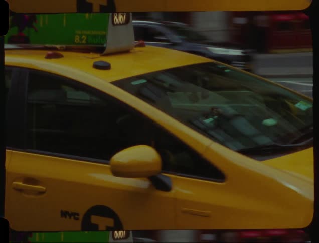 Busy street in a metropolis with vehicle traffic in a taxi