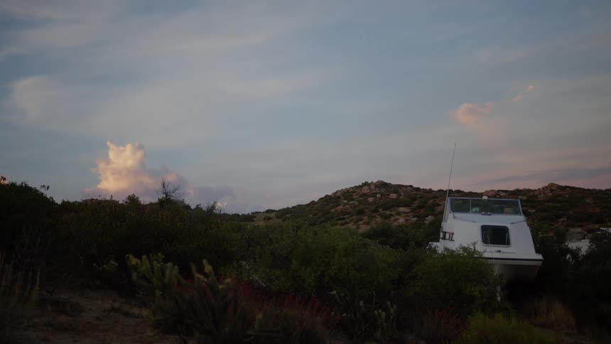 A boat on a grassy plain