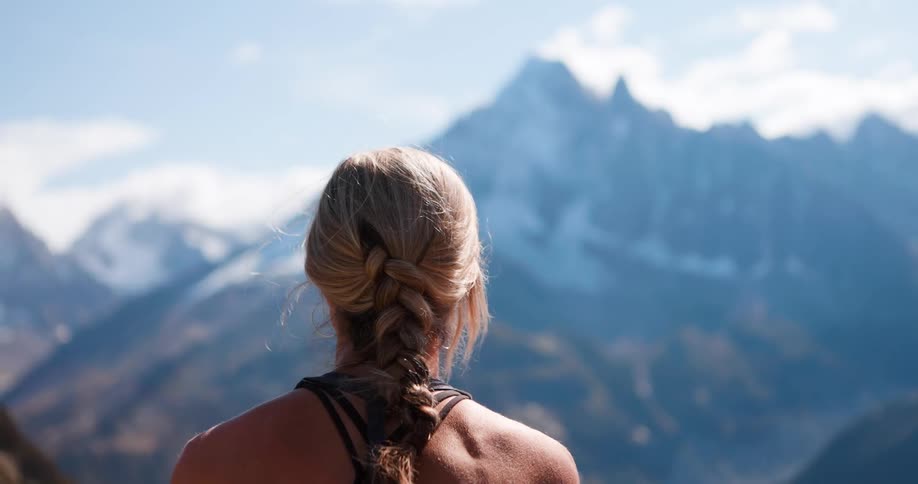 A back clip of a female hiker