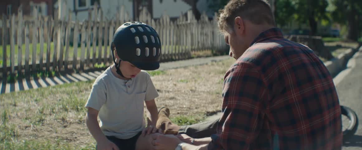 A clip of a father helping out a son